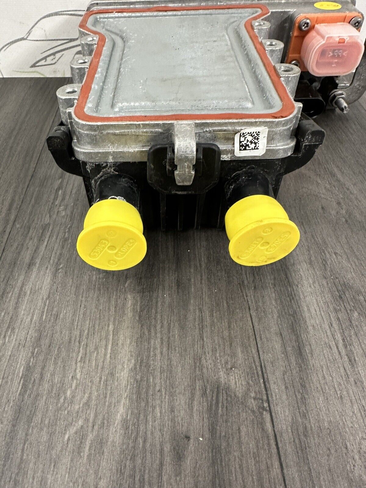 6307740
