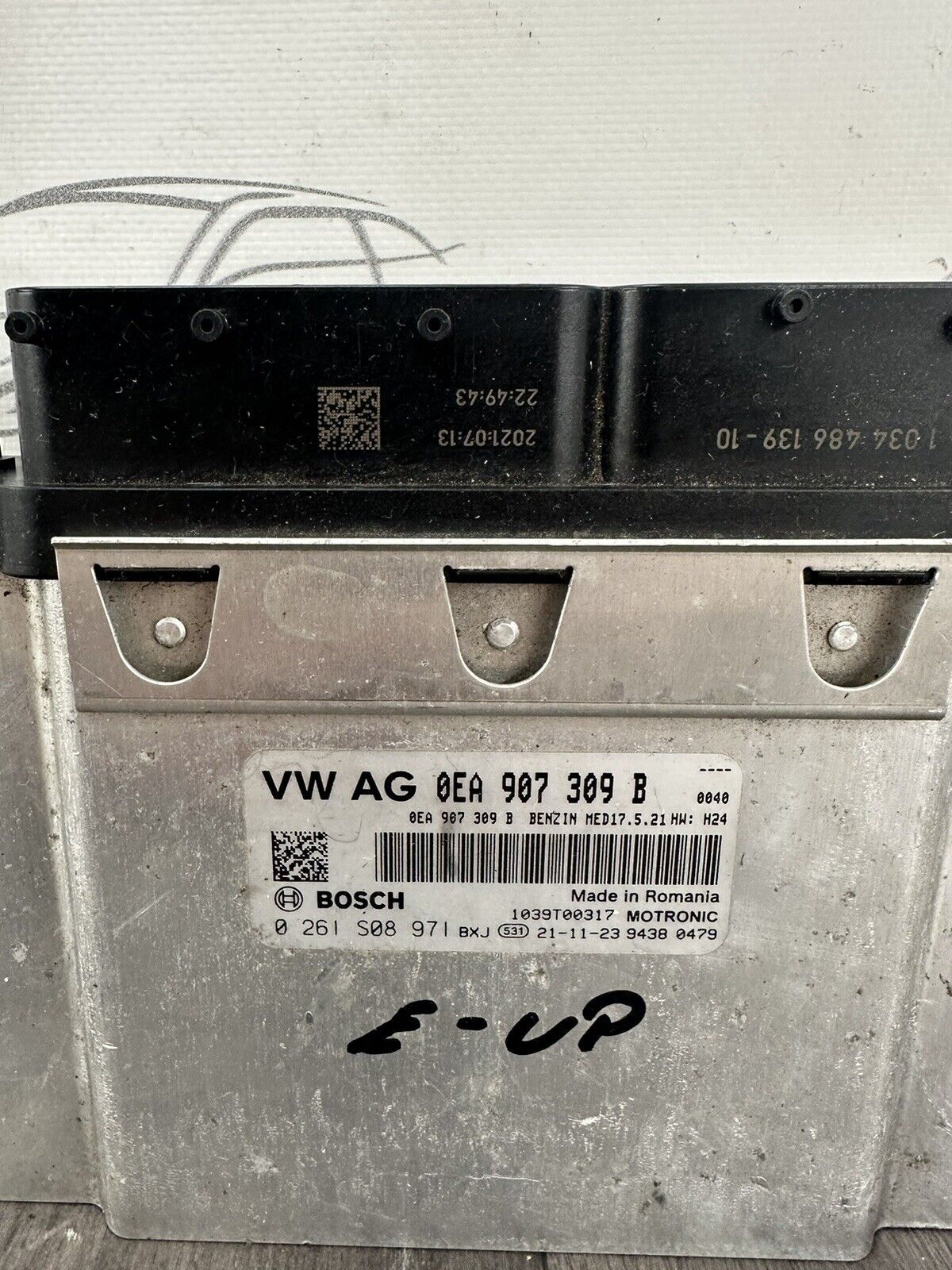 6305696