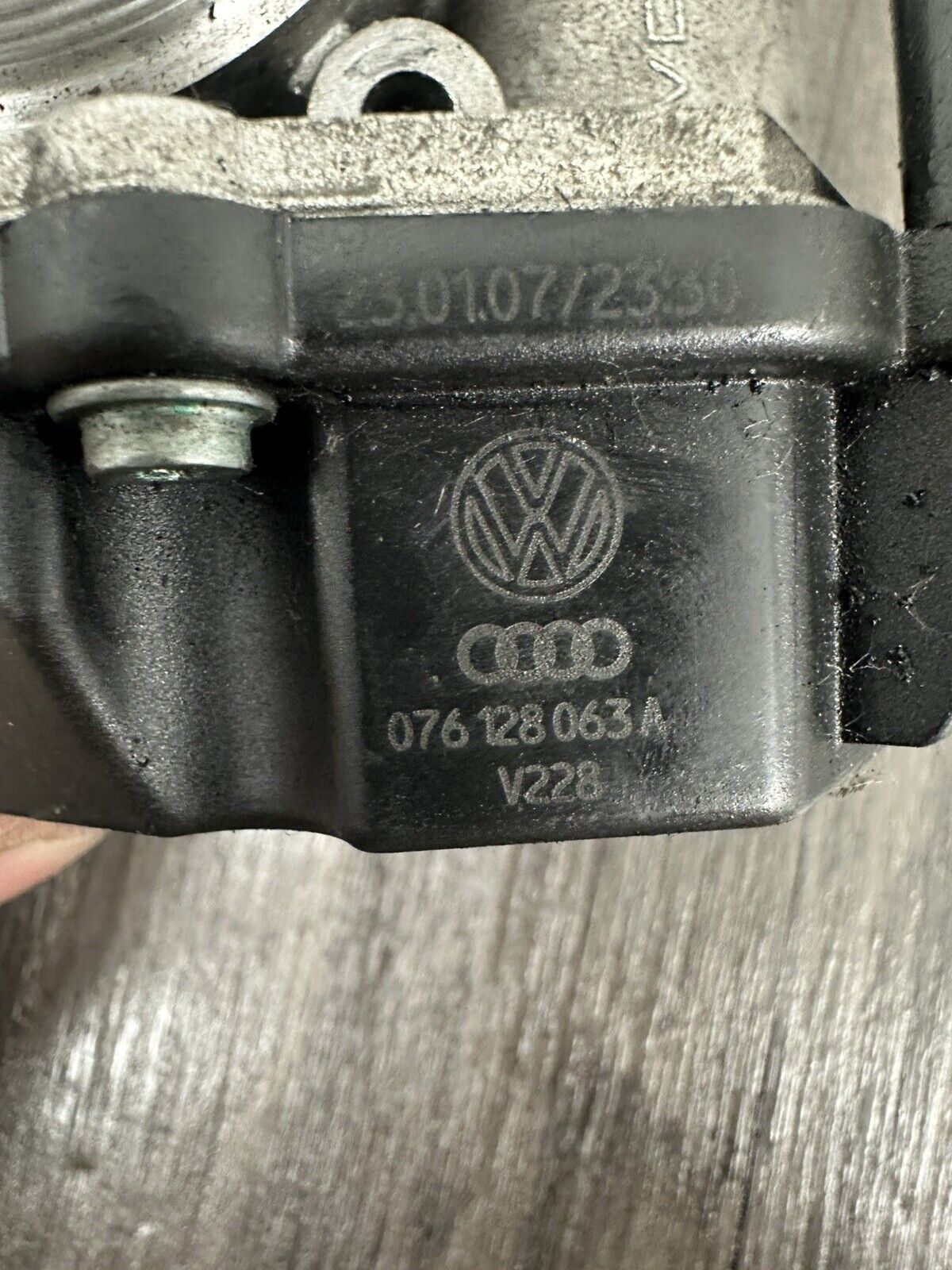 6308299