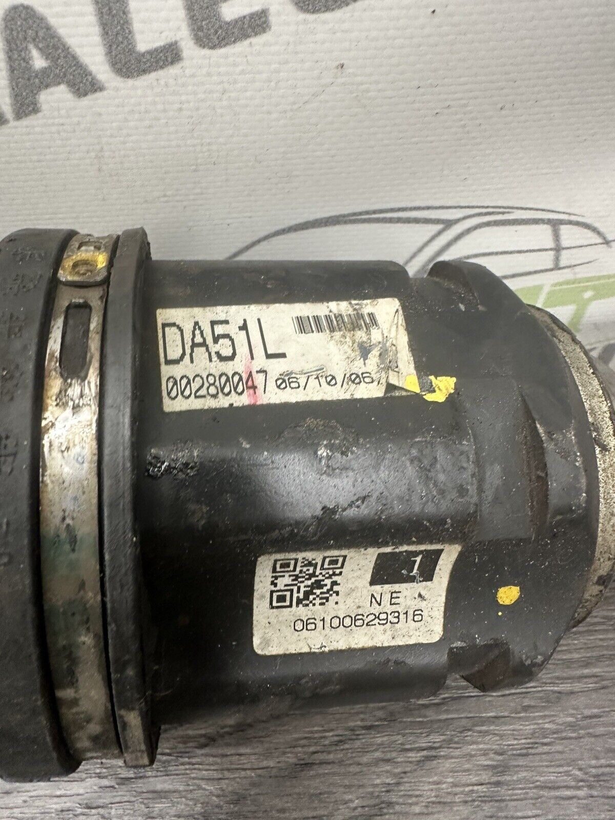 6307043