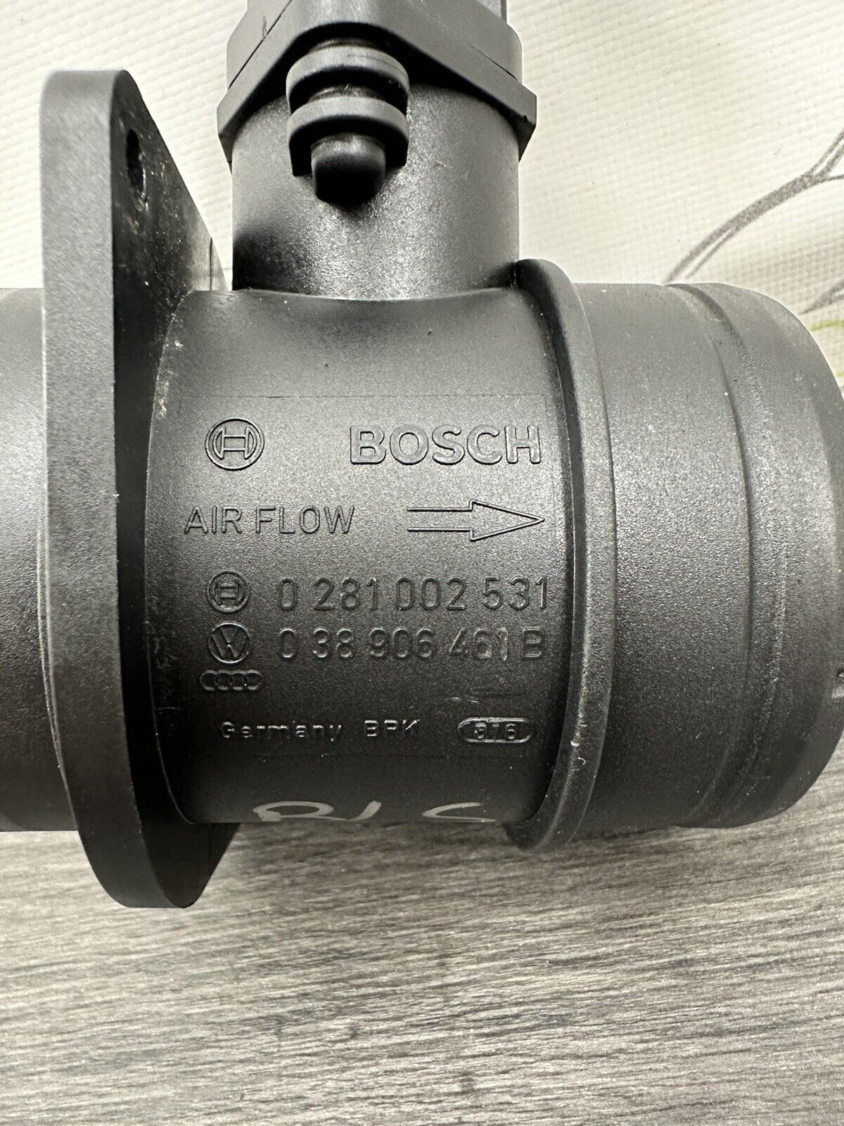 6308973