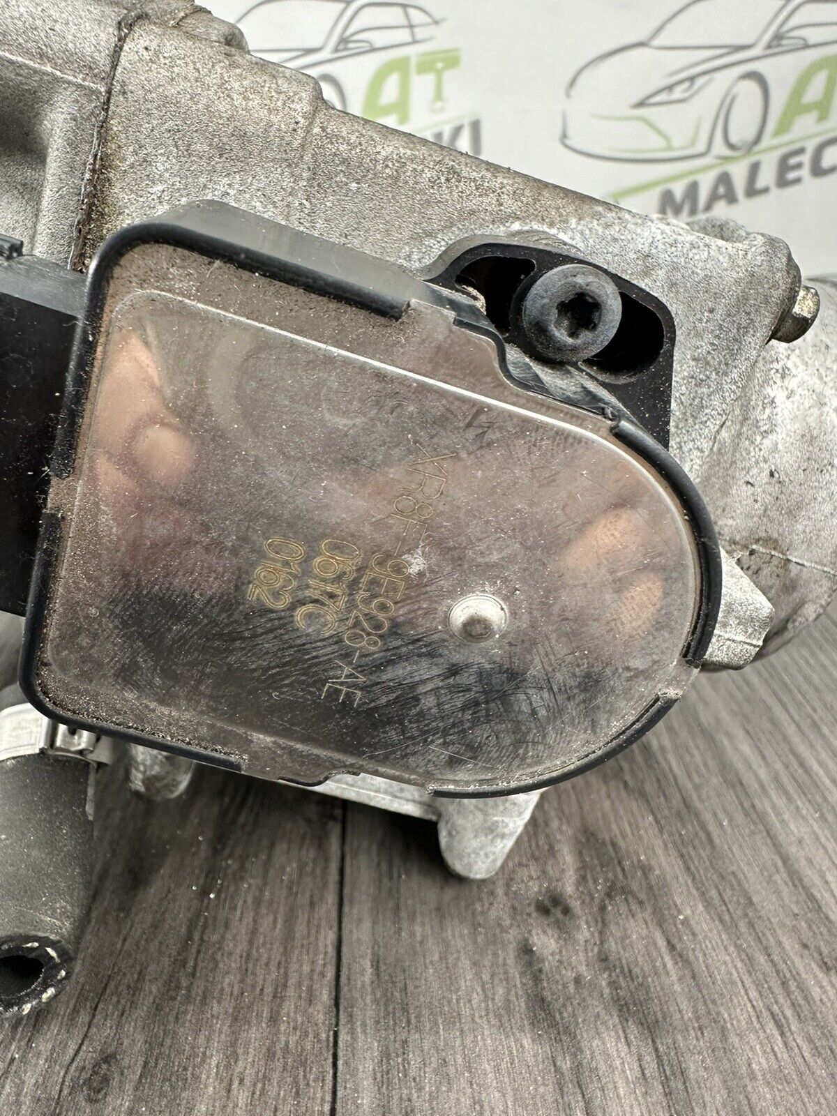 6308899