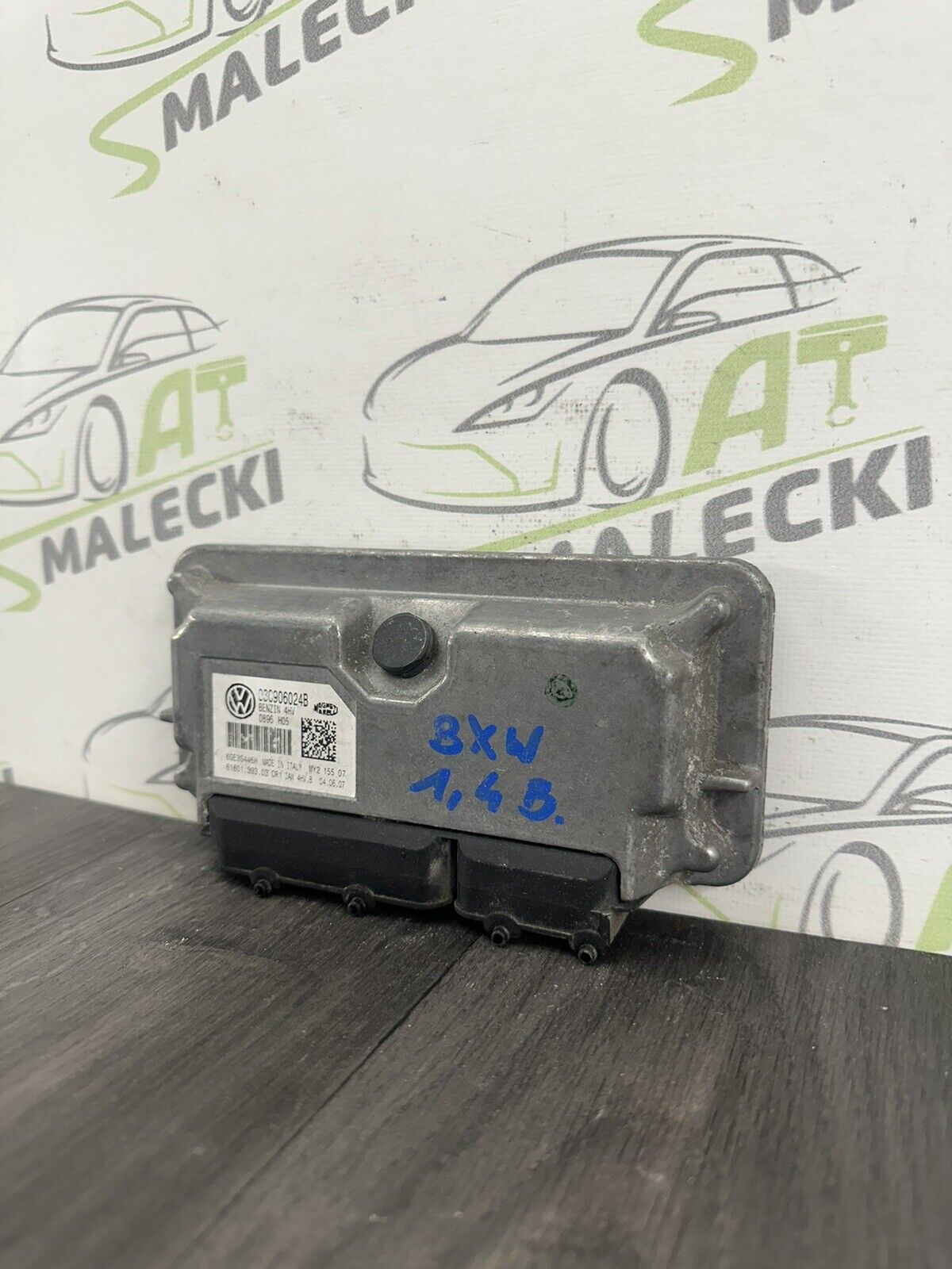 6304698
