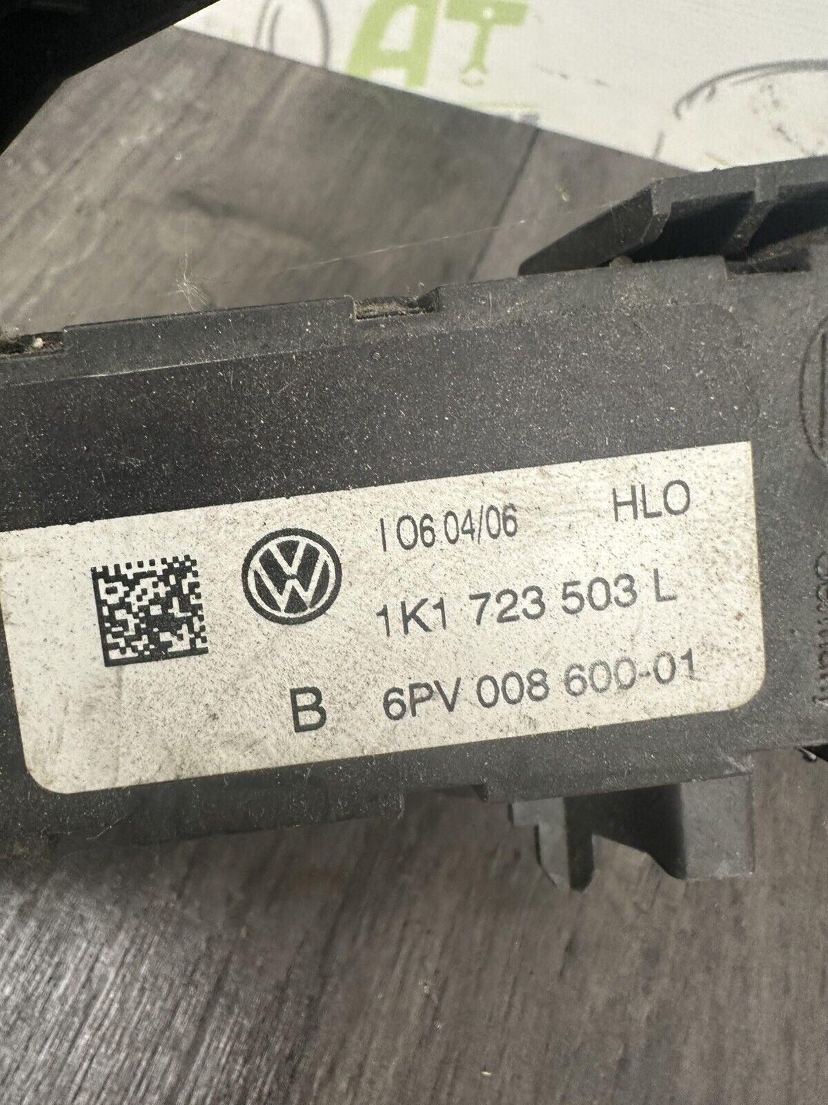 6308563