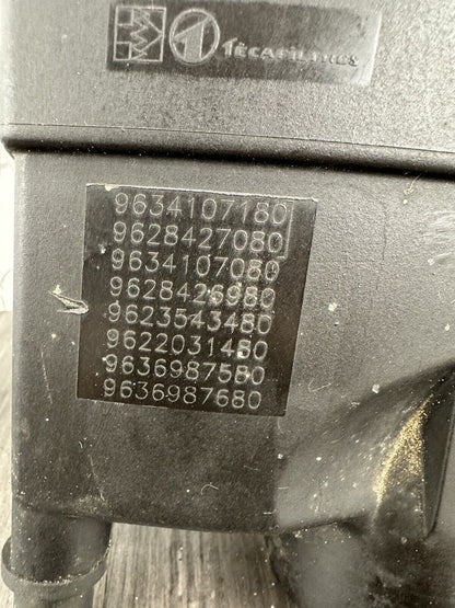 6305976