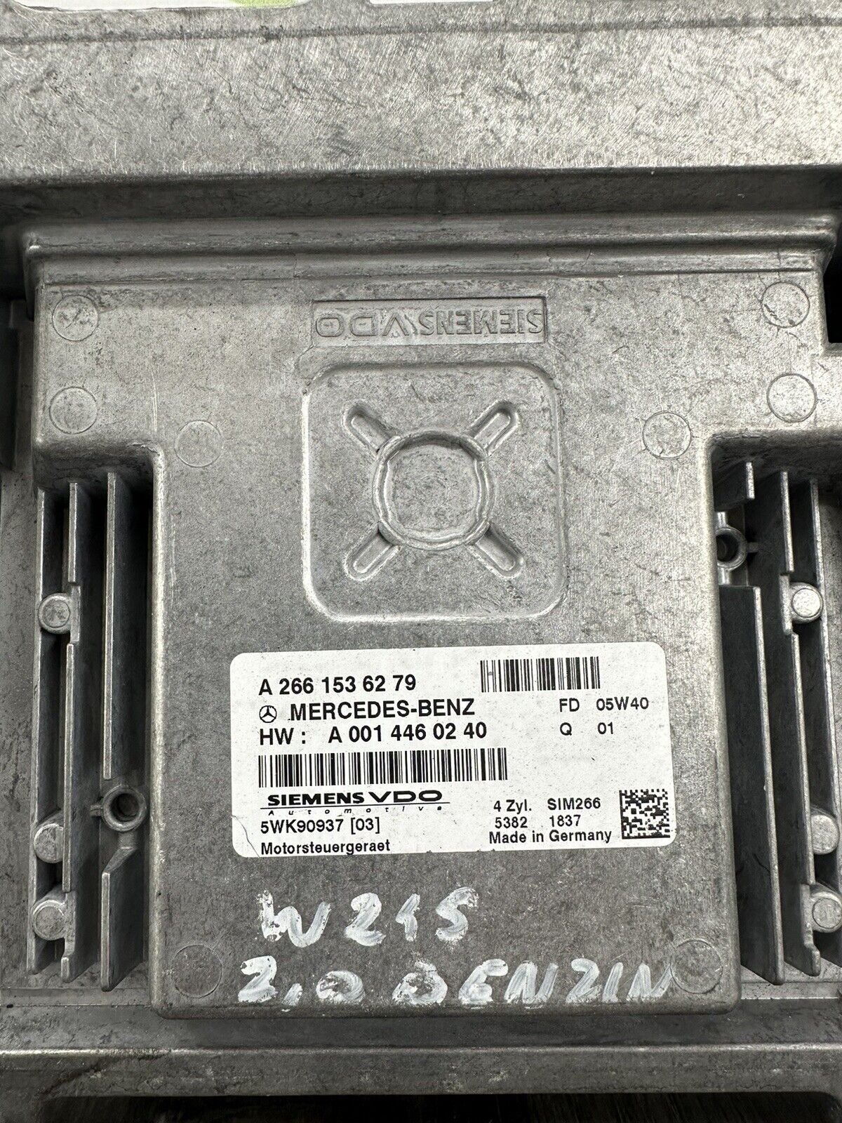 6305702