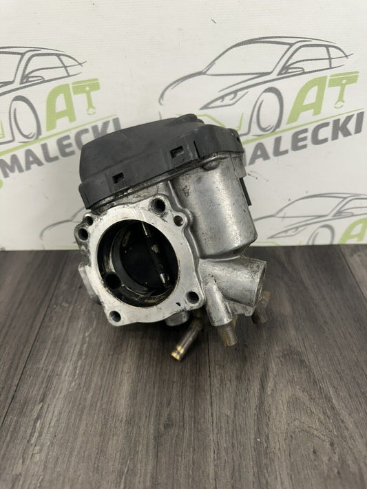 6308318